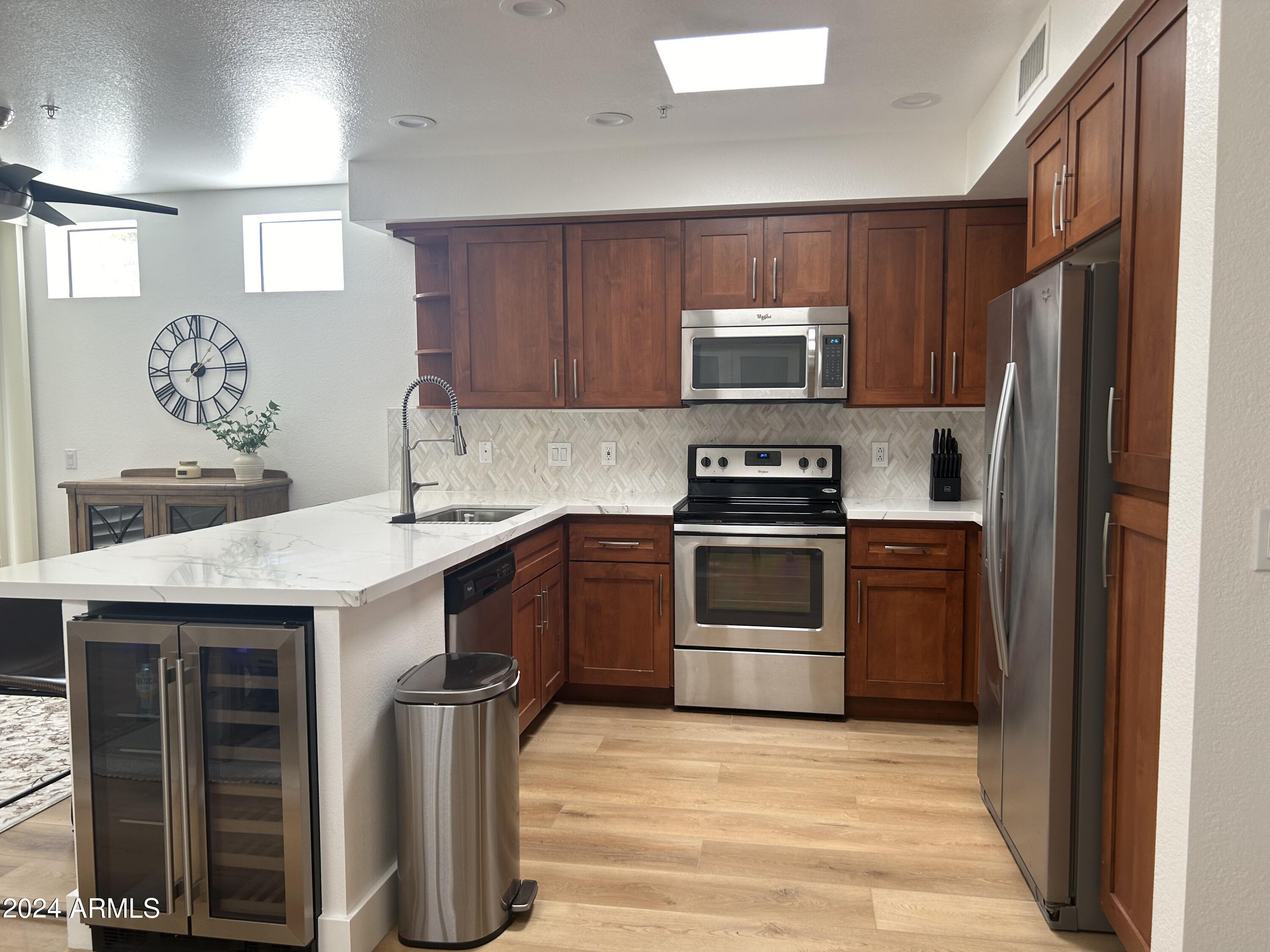 7222 East Gainey Ranch Road, Unit 232 Scottsdale, AZ 85258 - Photo 12 of 40 QUARTZ COUNTERS-GOURMET KITCHEN