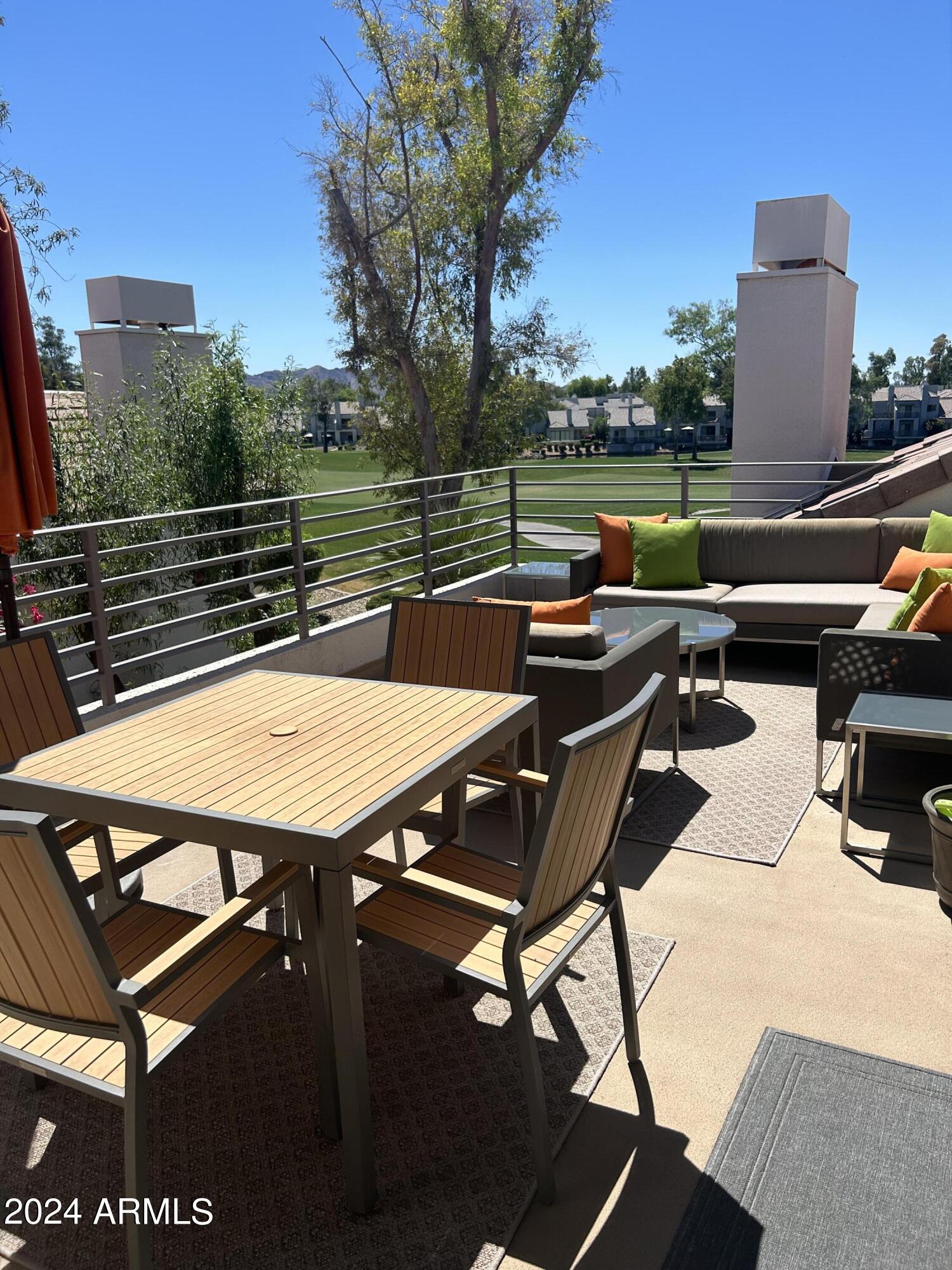 7222 East Gainey Ranch Road, Unit 232 Scottsdale, AZ 85258 - Photo 15 of 40 ACCESS OUT TO PATIO FROM LIVING AREA