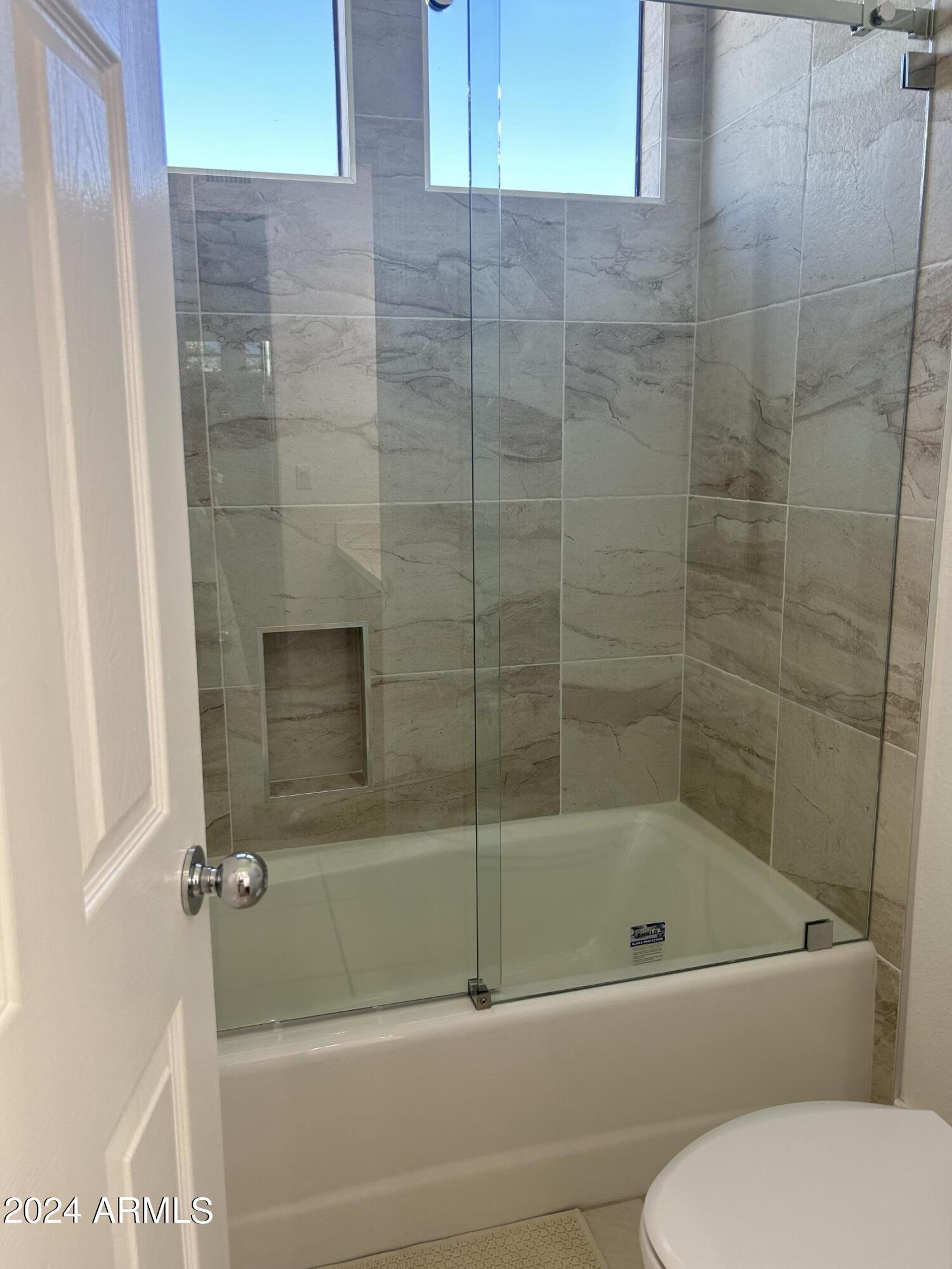 7222 East Gainey Ranch Road, Unit 232 Scottsdale, AZ 85258 - Photo 18 of 40 TUB W GLASS ENCLOSURE