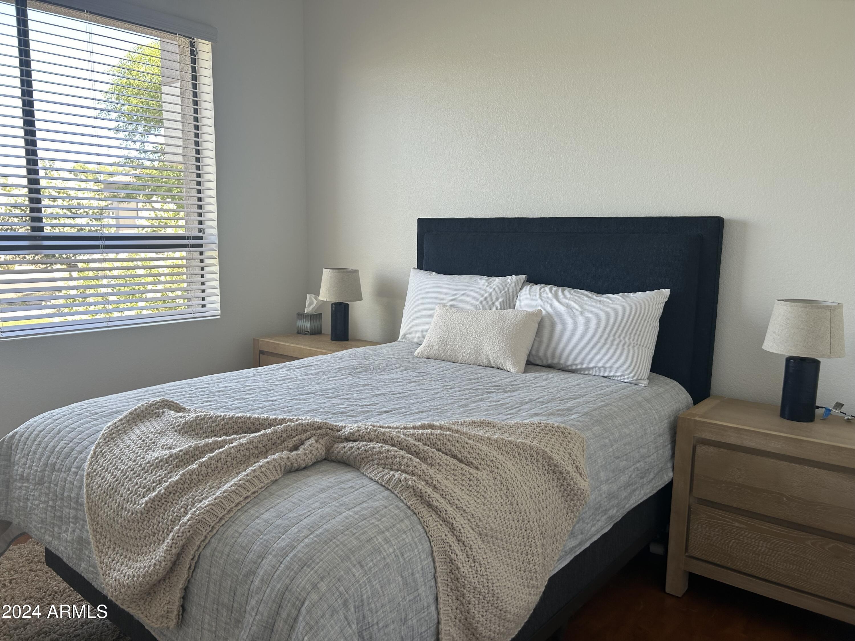 7222 East Gainey Ranch Road, Unit 232 Scottsdale, AZ 85258 - Photo 22 of 40 GUEST BED W QUEEN BED