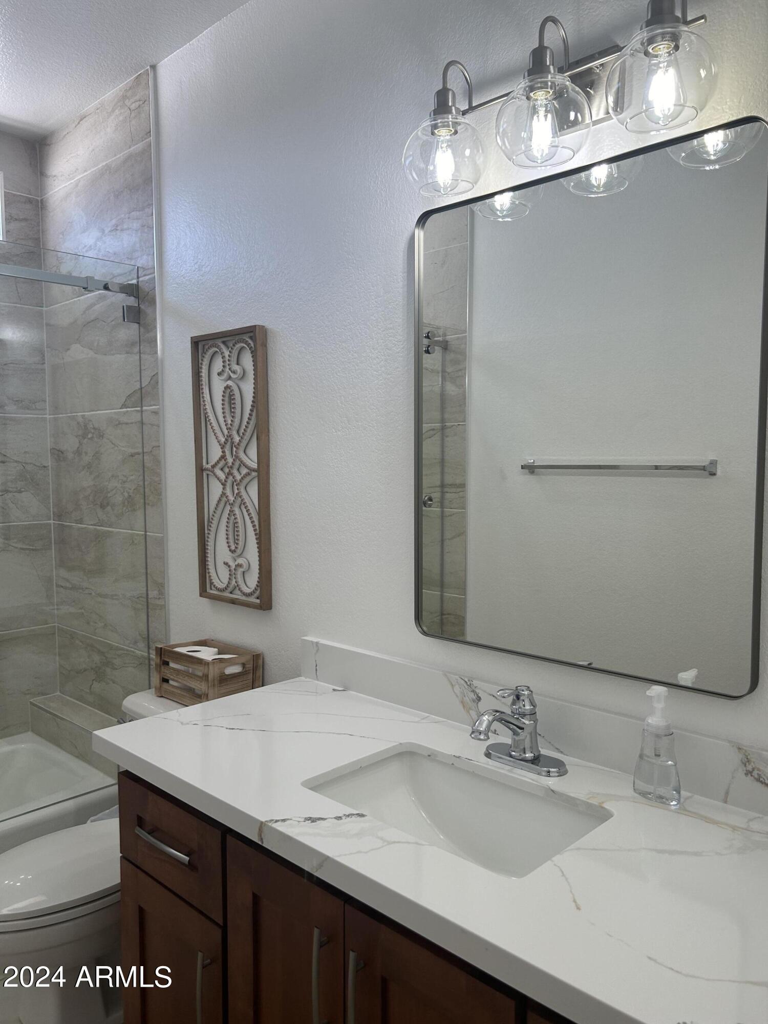 7222 East Gainey Ranch Road, Unit 232 Scottsdale, AZ 85258 - Photo 25 of 40 NEW QUARTZ COUNTERS