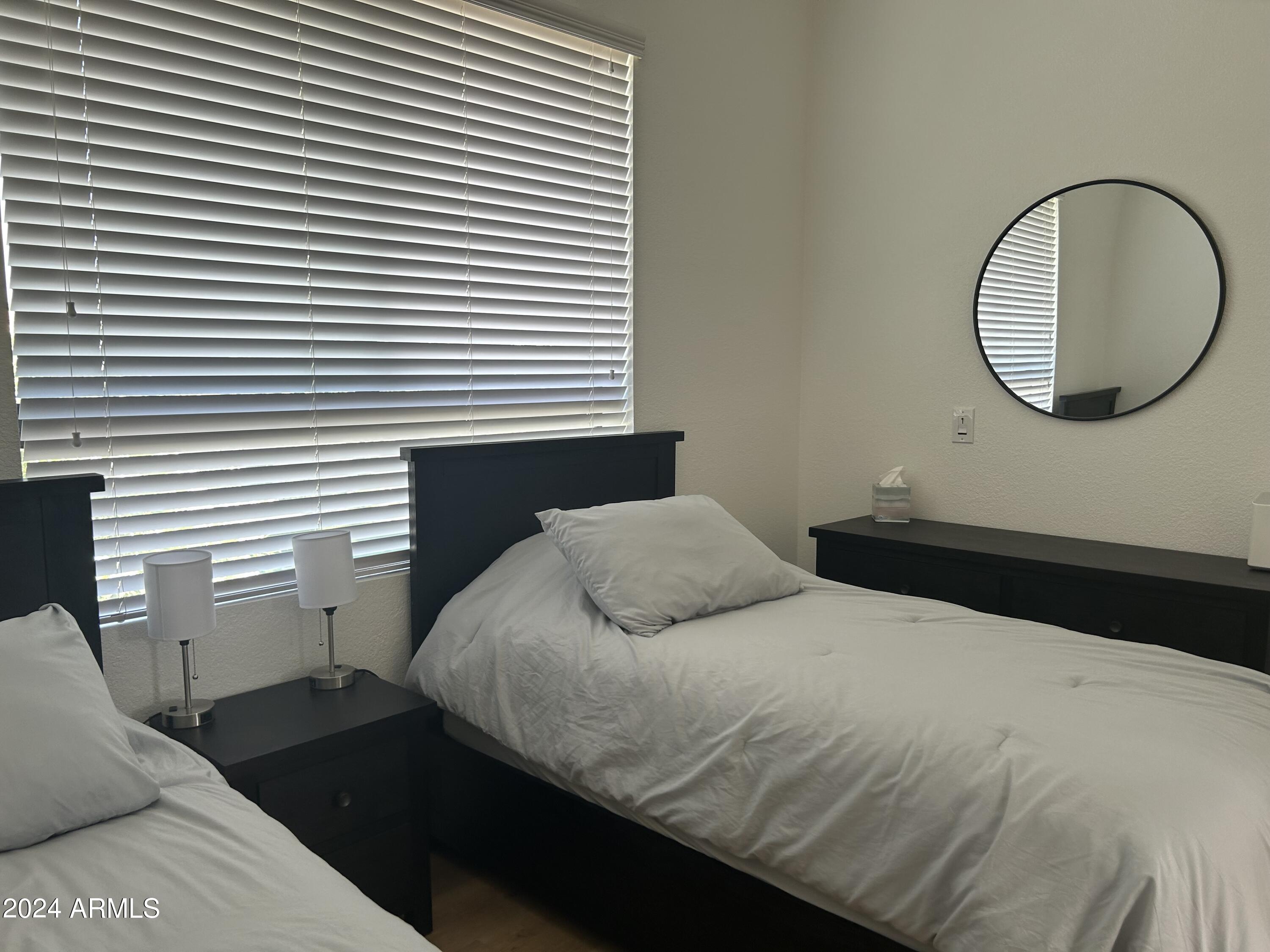 7222 East Gainey Ranch Road, Unit 232 Scottsdale, AZ 85258 - Photo 26 of 40 TWIN BEDS IN DEN