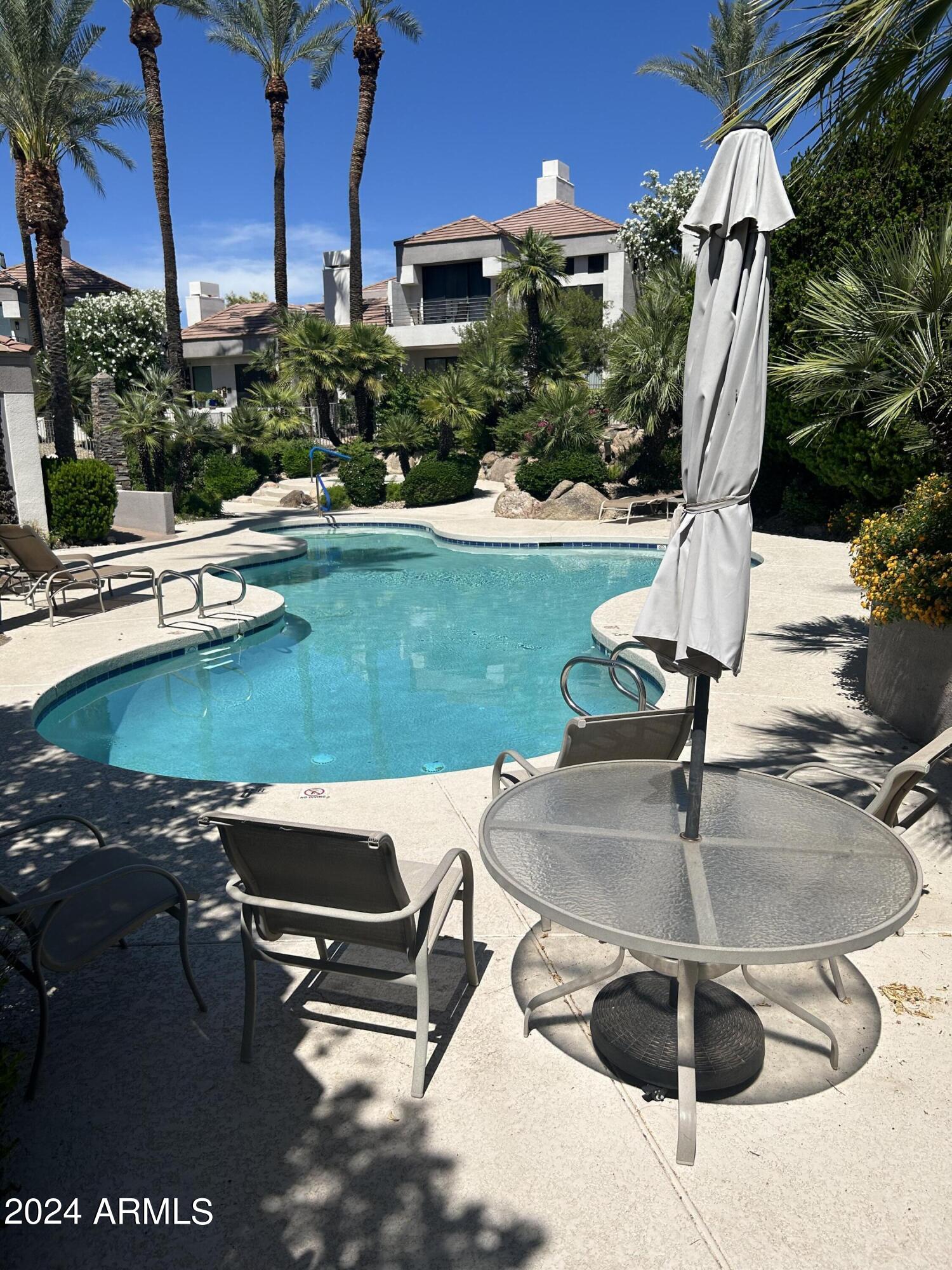 7222 East Gainey Ranch Road, Unit 232 Scottsdale, AZ 85258 - Photo 31 of 40 COMM POOL AREA IN OASIS