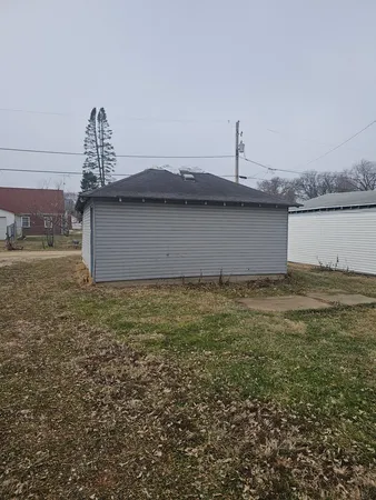 a view of a water fountain in front of a house