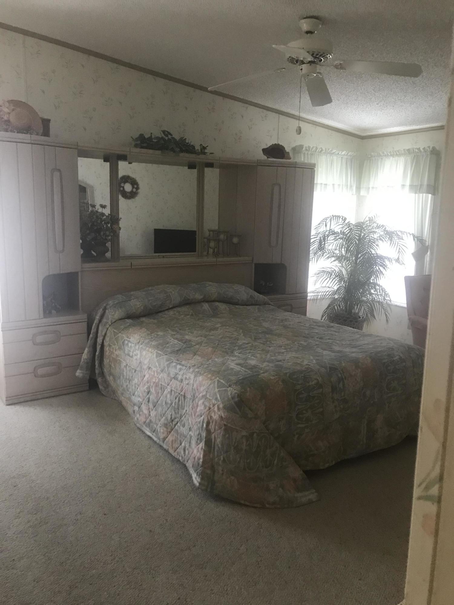 2709 Southwest Olds Place Stuart, FL 34997 - Photo 13 of 16 master bedroom view 1