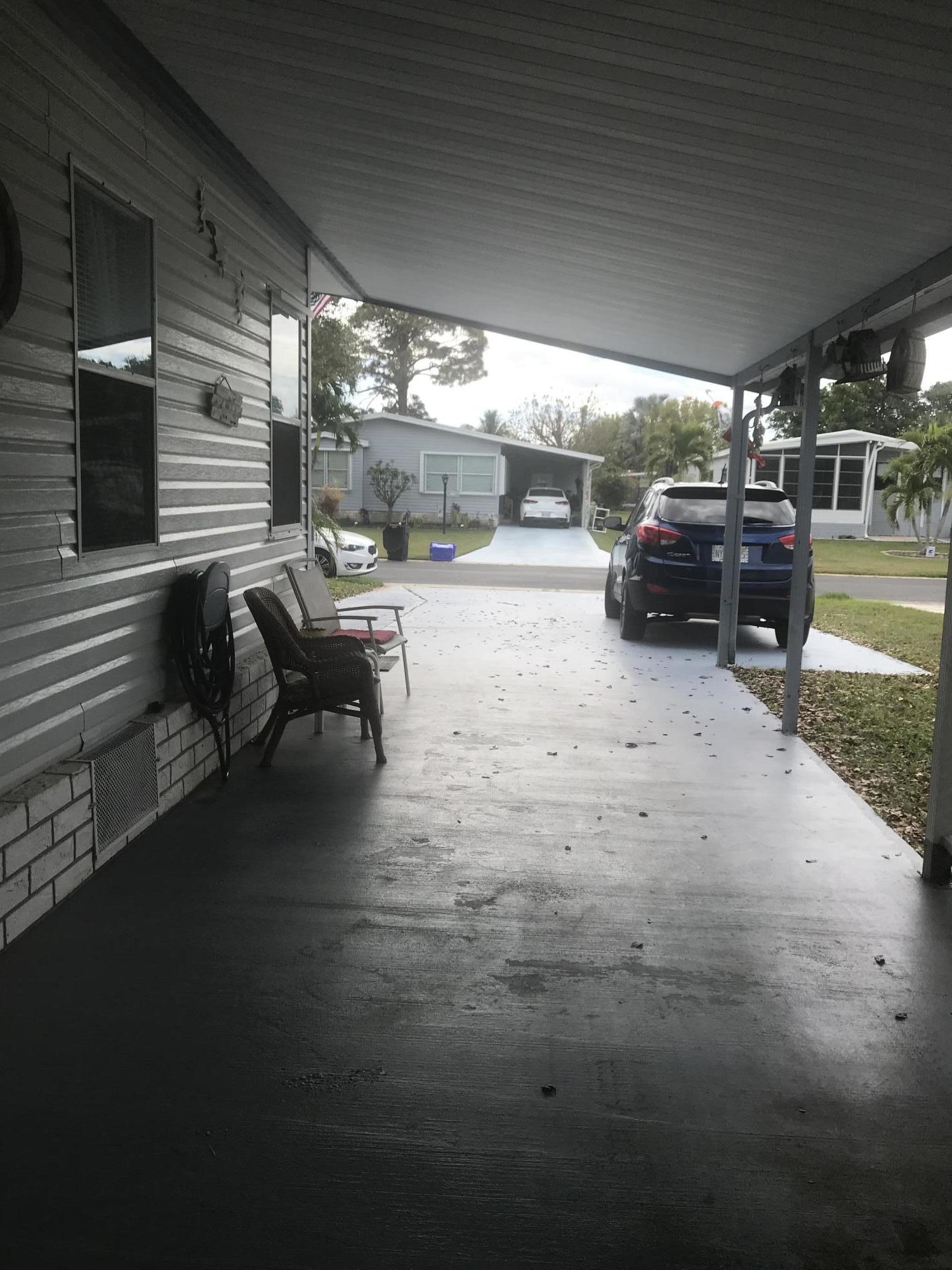 2709 Southwest Olds Place Stuart, FL 34997 - Photo 2 of 16 double wide driveway