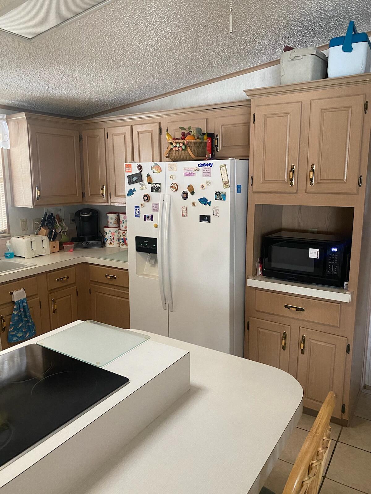 2709 Southwest Olds Place Stuart, FL 34997 - Photo 7 of 16 kitchen view 1