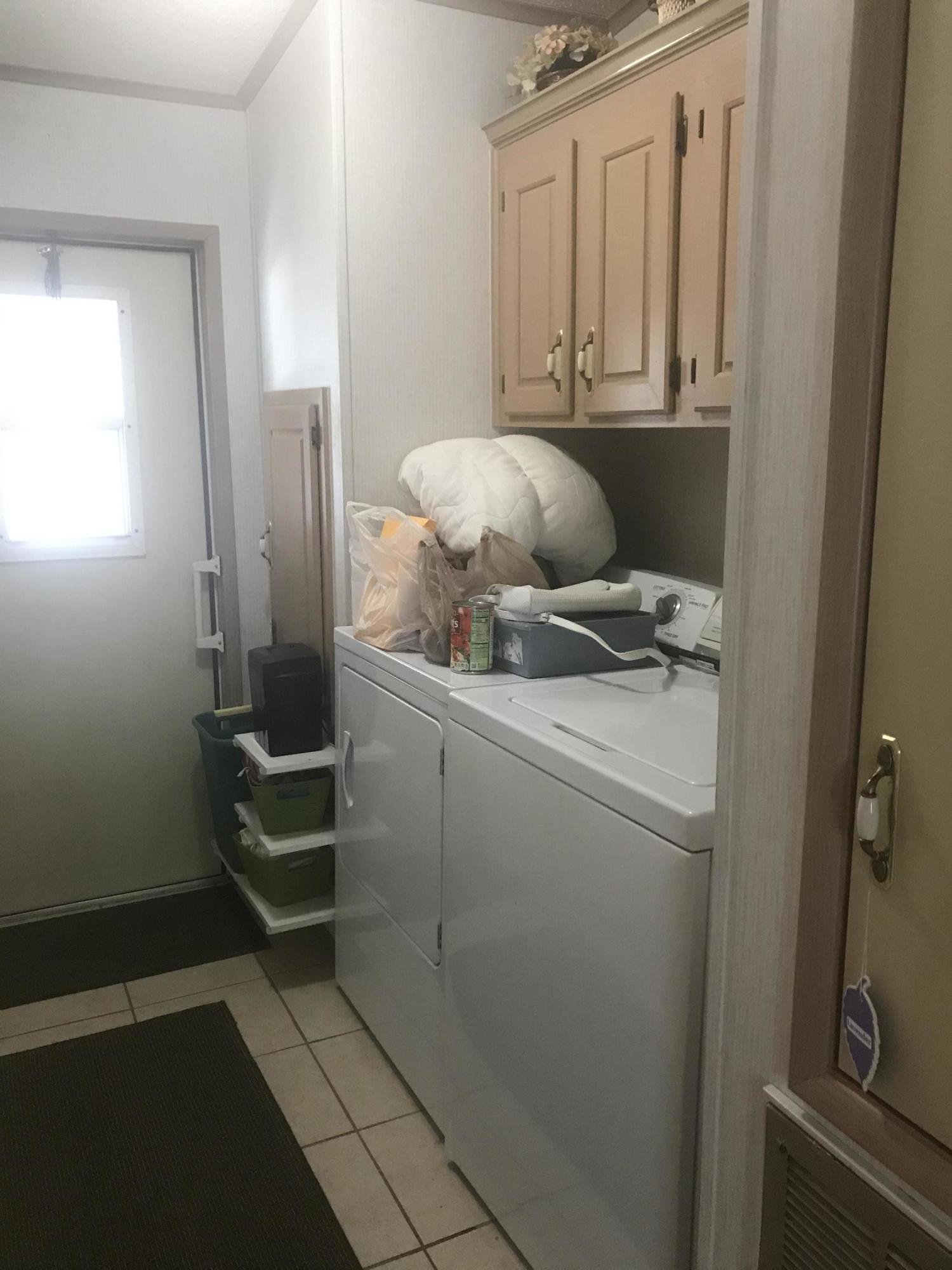 2709 Southwest Olds Place Stuart, FL 34997 - Photo 10 of 16 inside laundry 1