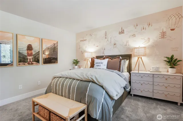 a bedroom with a bed and window