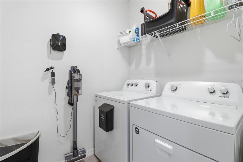 660 Hickory Course Loop Ocala, FL 34472 - Photo 33 of 45 a utility room with dryer and washer