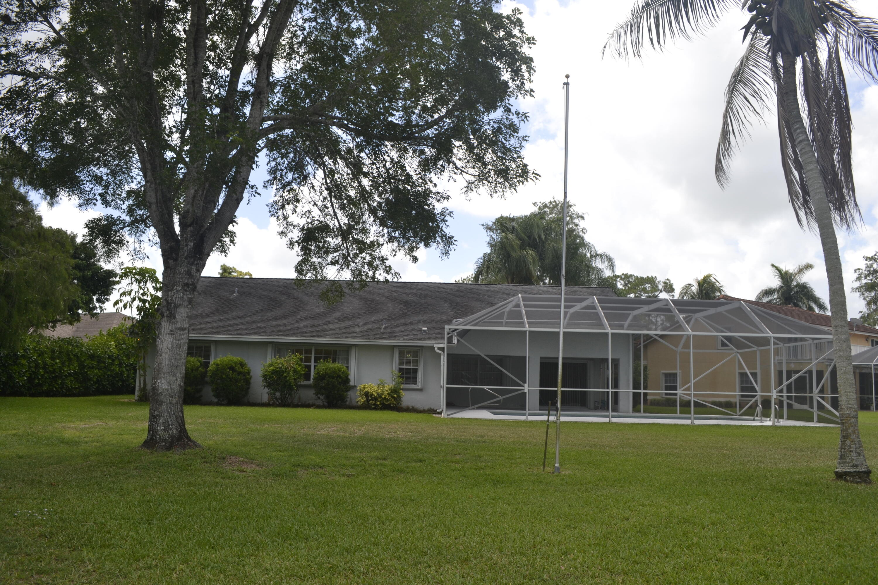 1104 Raintree Lane Wellington, FL 33414 - Photo 21 of 30 Ext Back CBS House