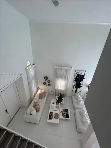 a room with furniture and a chandelier