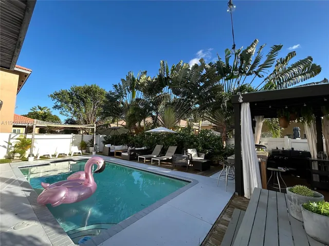 a view of a backyard with plants