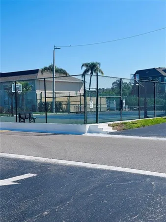 a view of a patio with swimming pool table and chairs