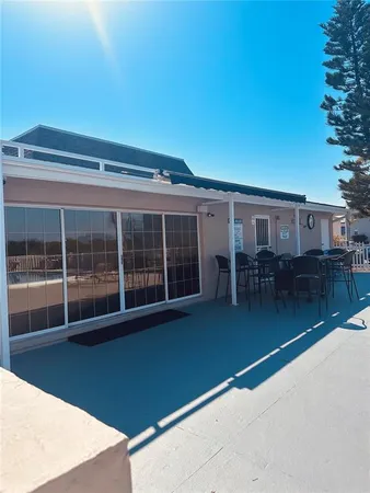 a utility room with sink dryer and washer