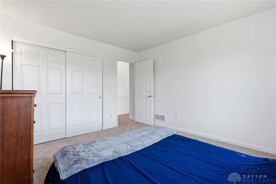 70 Martin Lane Springboro, OH 45066 - Photo 32 of 69 This cozy room offers a tranquil retreat with soft carpeting and ample natural light.
