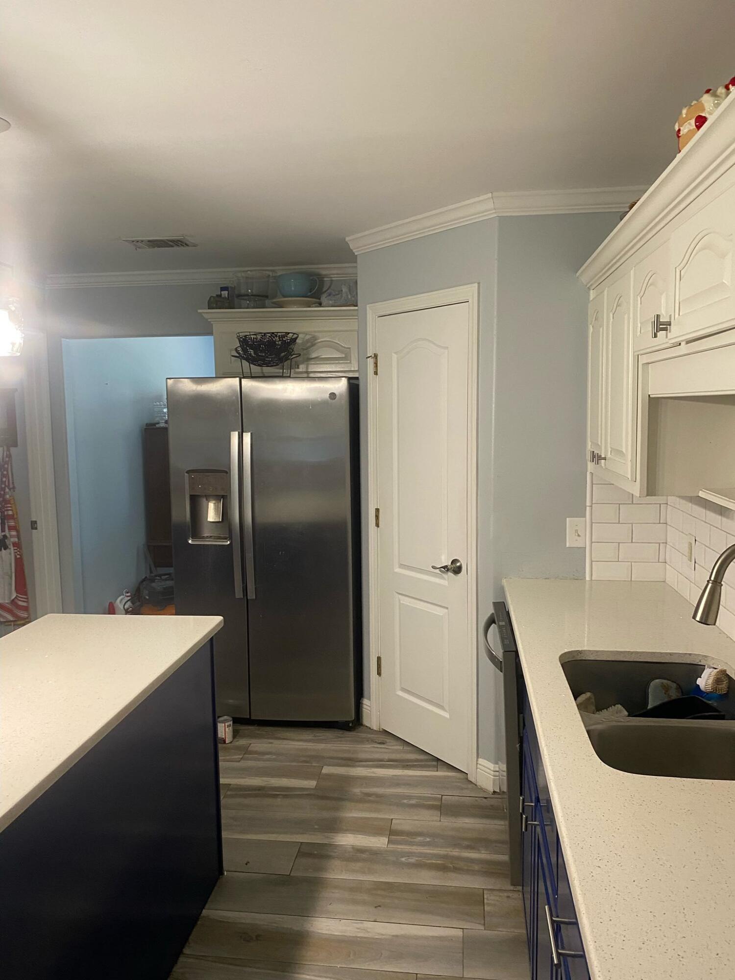 421 Swift Fox Run Crestview, FL 32536 - Photo 5 of 35 Kitchen Toward Pantry