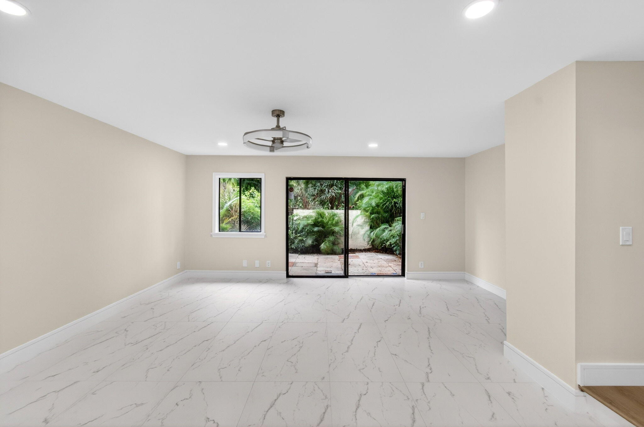 1330 Northwest 13th Street, Unit 12 Boca Raton, FL 33486 - Photo 13 of 52 a view of an empty room with a window