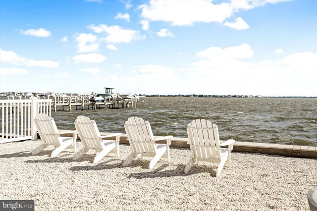 a front view of a house with a ocean view