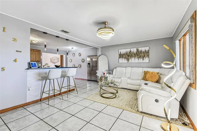 a kitchen with a sink and a stove