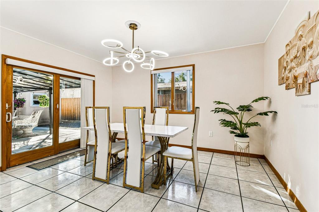 226 Maple Avenue Palm Harbor, FL 34684 - Photo 23 of 79 a view of a dining room with furniture
