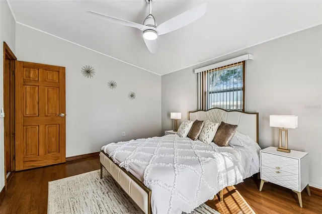 a kitchen with stainless steel appliances granite countertop a refrigerator and a stove