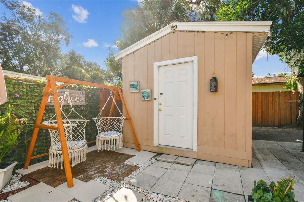 226 Maple Avenue Palm Harbor, FL 34684 - Photo 57 of 79 a view of a house with a yard