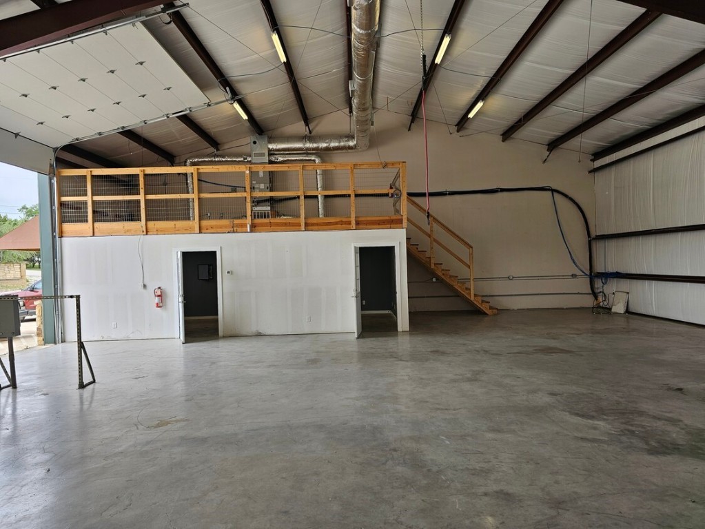 4819 R O Drive, Unit 201 Spicewood, TX 78669 - Photo 15 of 21 a view of an empty room with a window