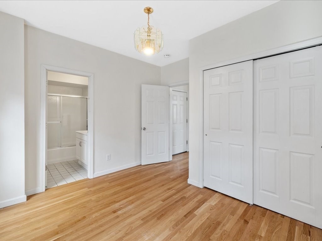 345-347 Hanover Street Boston, MA 02113 - Photo 14 of 22 a view of empty room with wooden floor