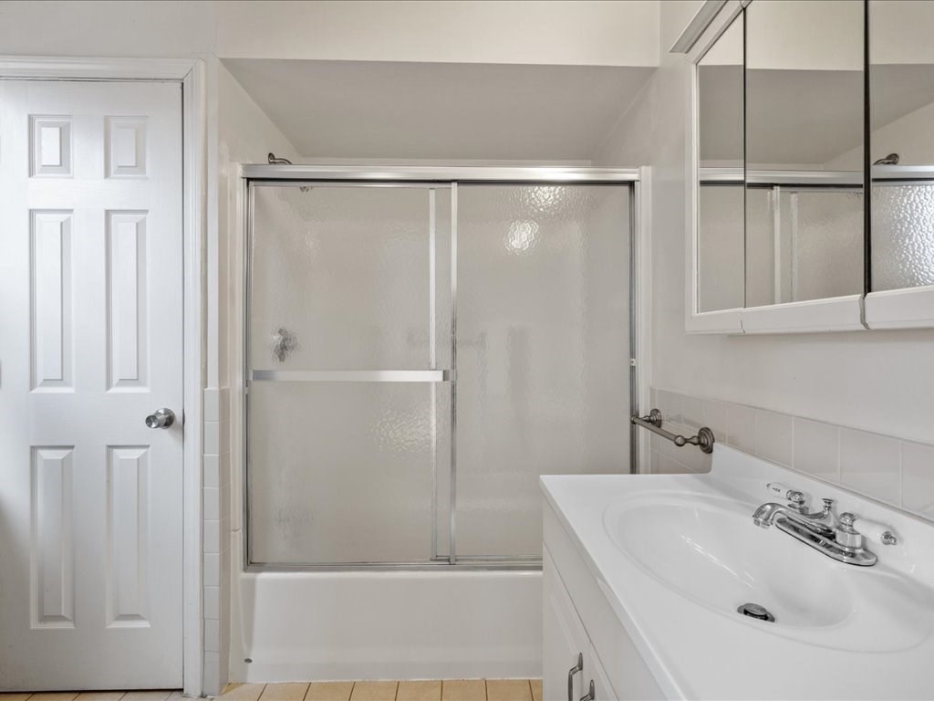 345-347 Hanover Street Boston, MA 02113 - Photo 15 of 22 a bathroom with a shower and a sink