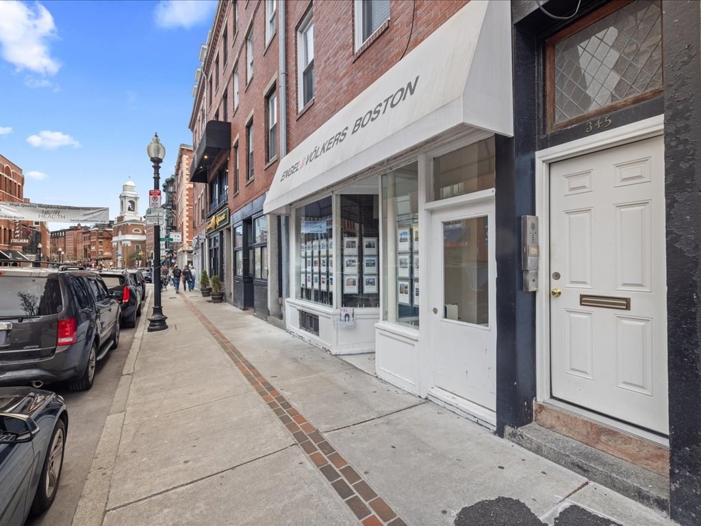 345-347 Hanover Street Boston, MA 02113 - Photo 2 of 22 a view of a building with car parked