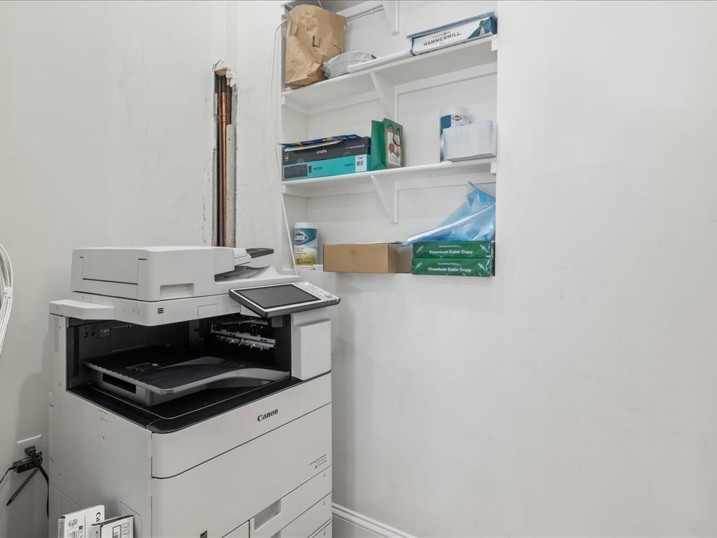 345-347 Hanover Street Boston, MA 02113 - Photo 9 of 22 a white stove top oven sitting inside of a kitchen