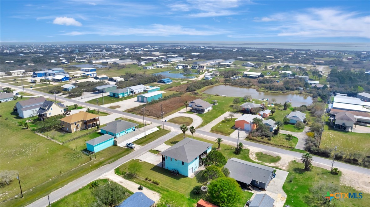 23 Macey Street Port O'Connor, TX 77982 - Photo 40 of 40 an aerial view of residential houses with outdoor space