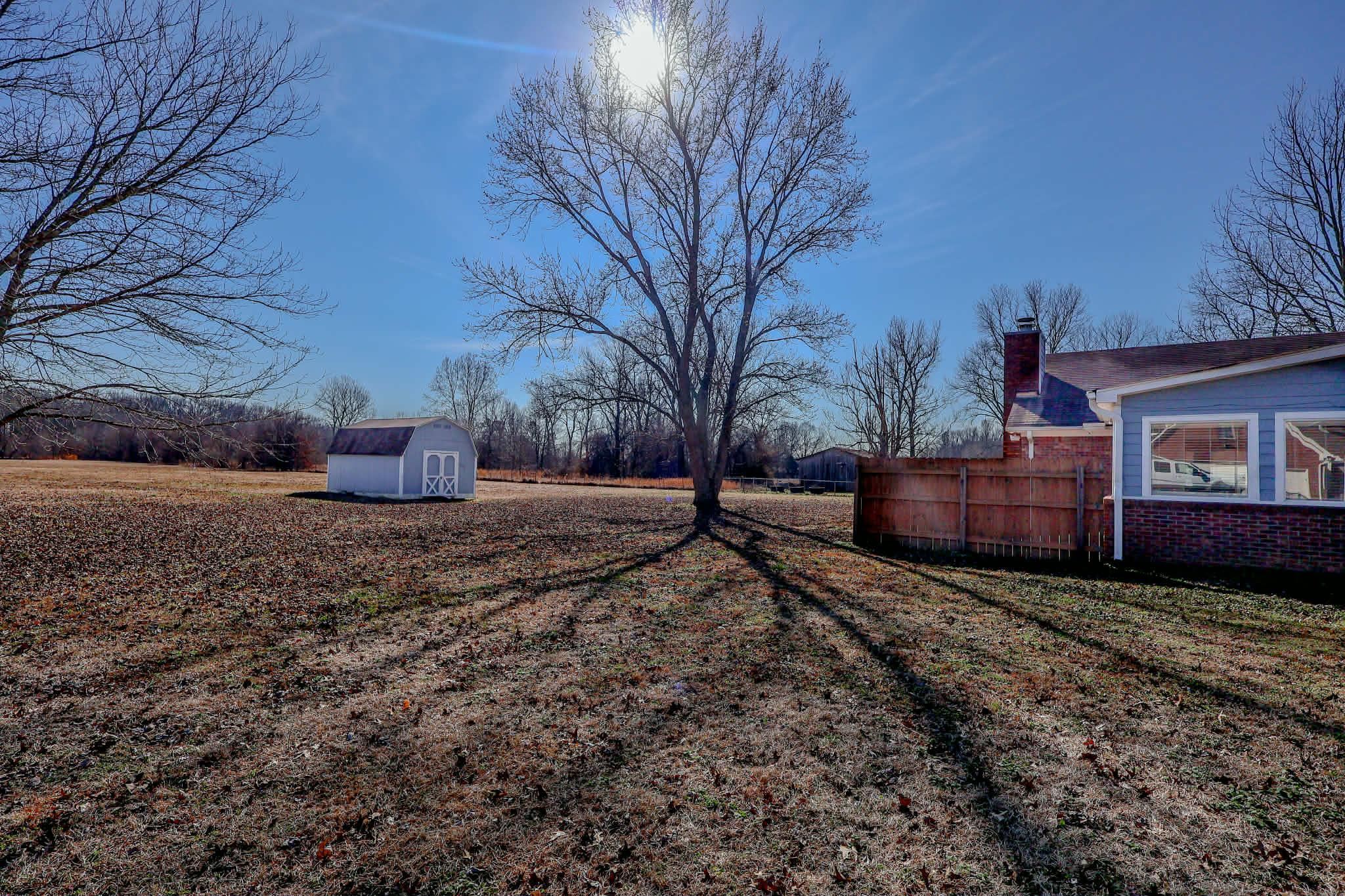 8712 Gragg Road Millington, TN 38053 - Photo 32 of 36 View of yard with a storage unit
