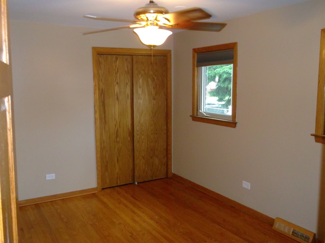 10854 Major Avenue Chicago Ridge, IL 60415 - Photo 13 of 24 an empty room with windows and closet