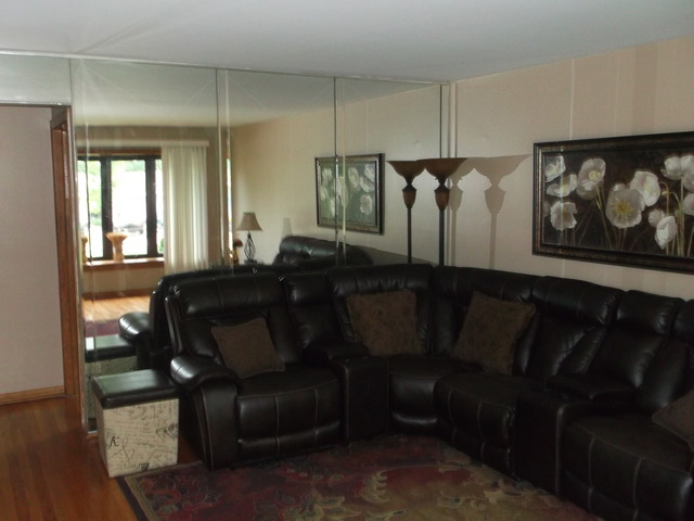 10854 Major Avenue Chicago Ridge, IL 60415 - Photo 3 of 24 a living room with furniture and wooden floor