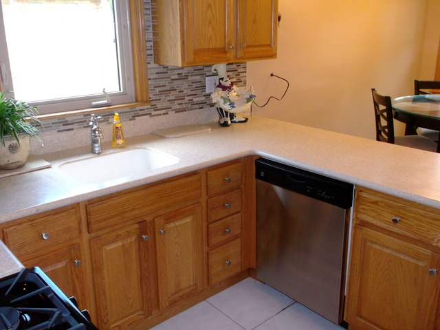 10854 Major Avenue Chicago Ridge, IL 60415 - Photo 7 of 24 a kitchen with a sink and cabinets