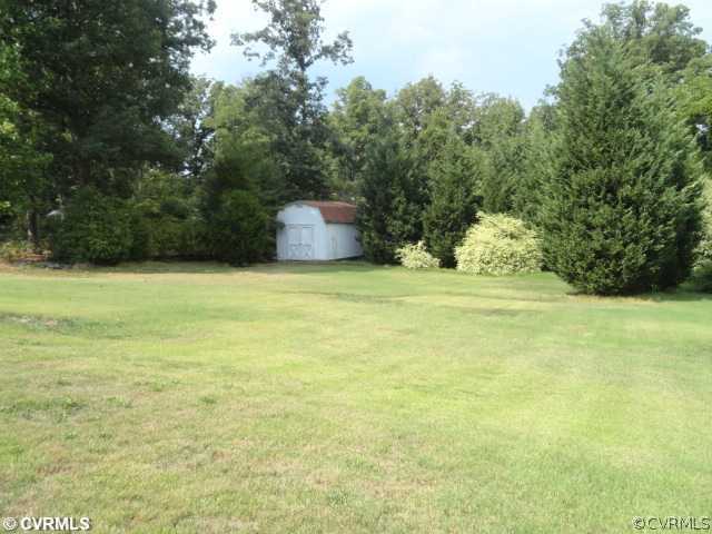 8312 Lansdowne Road Richmond, VA 23229 - Photo 4 of 6 a view of a yard with a tree