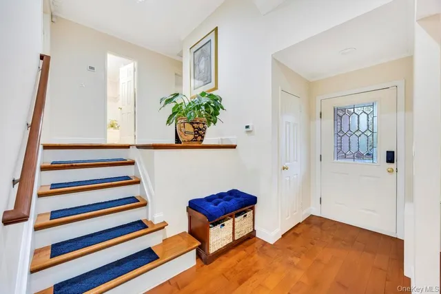 a view of entryway with a front door