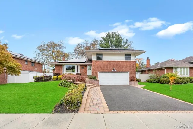a front view of house with yard