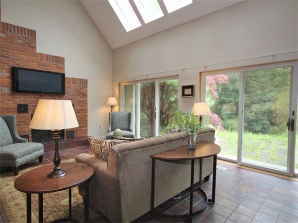 167 Tower Road Lincoln, MA 01773 - Photo 9 of 30 a living room with furniture and a large window