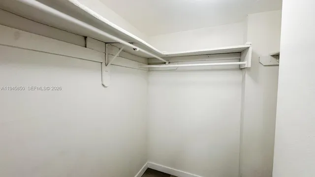 a view of a room with racks on the wall