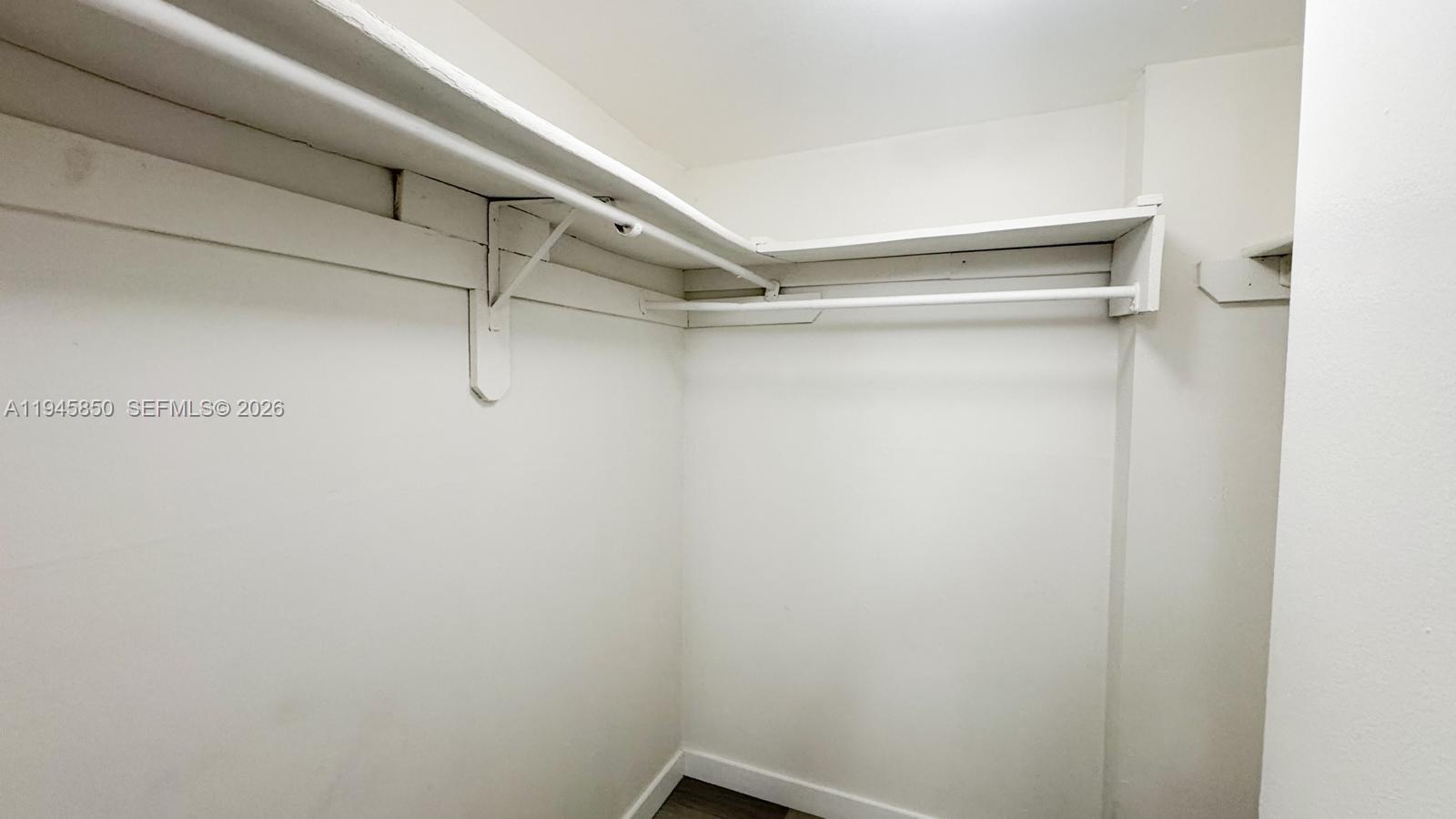 484 Northwest 165th St Road, Unit A314 Miami, FL 33169 - Photo 21 of 35 a view of a room with racks on the wall