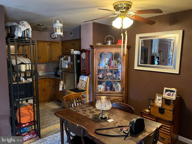 2586 Cranston Road Philadelphia, PA 19131 - Photo 9 of 37 a view of a dining room with furniture and chandelier