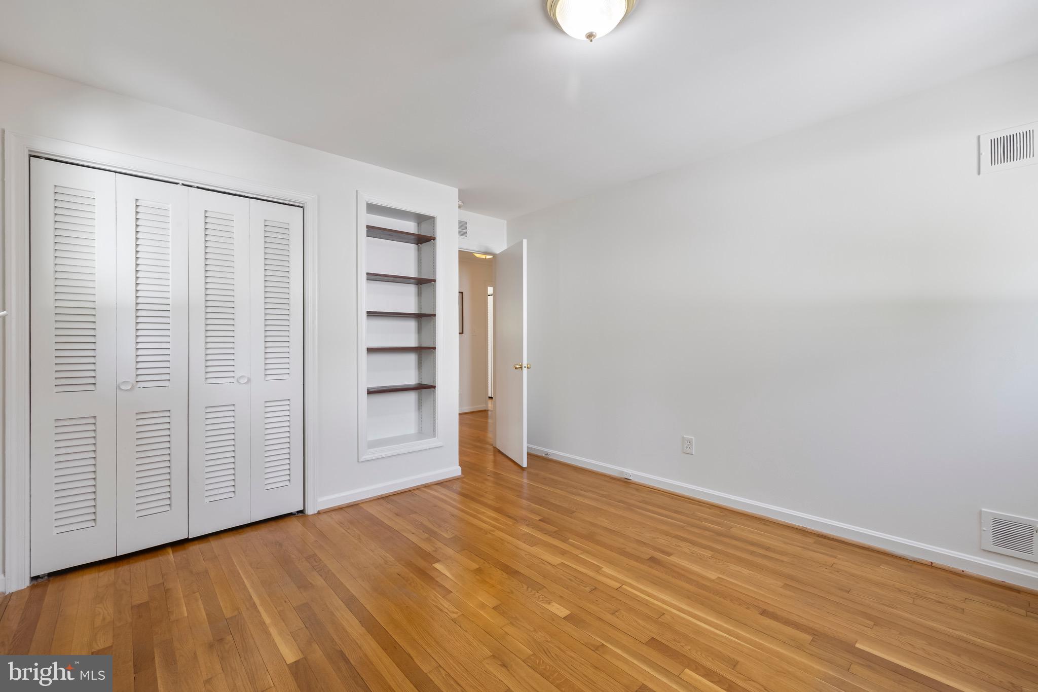 9821 Singleton Drive Bethesda, MD 20817 - Photo 20 of 45 a view of an empty room with a window