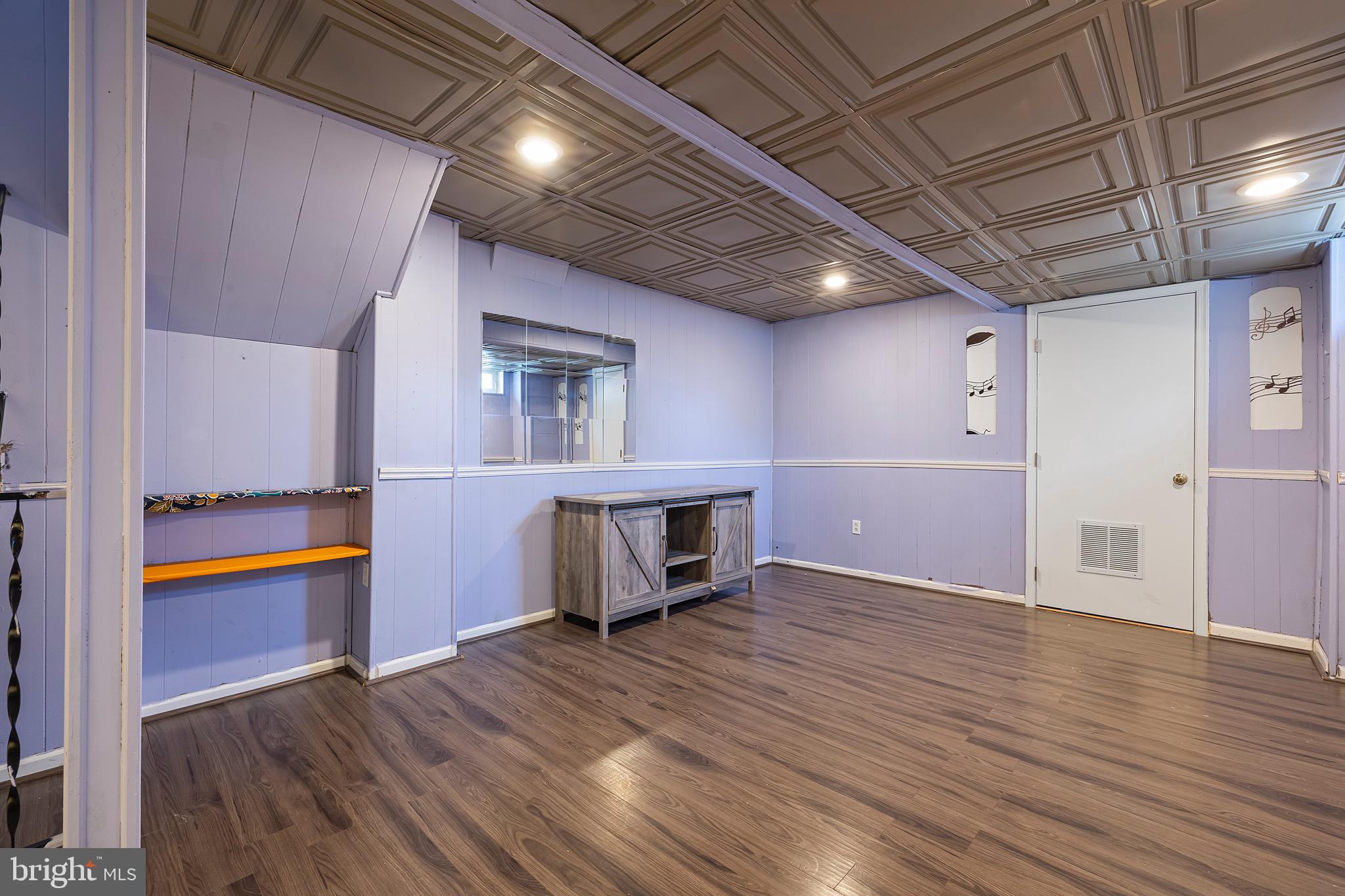 9821 Singleton Drive Bethesda, MD 20817 - Photo 35 of 45 a view of an empty room with a window
