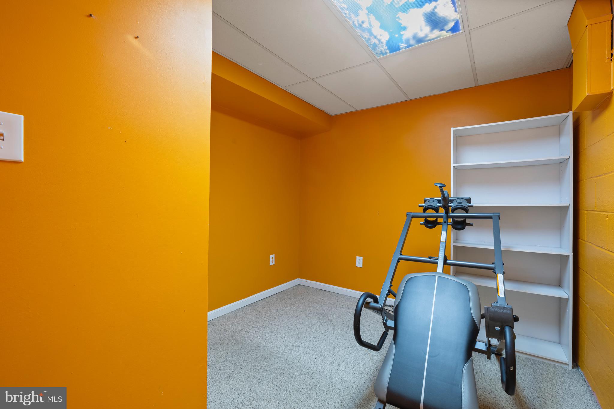 9821 Singleton Drive Bethesda, MD 20817 - Photo 39 of 45 a room with gym equipment