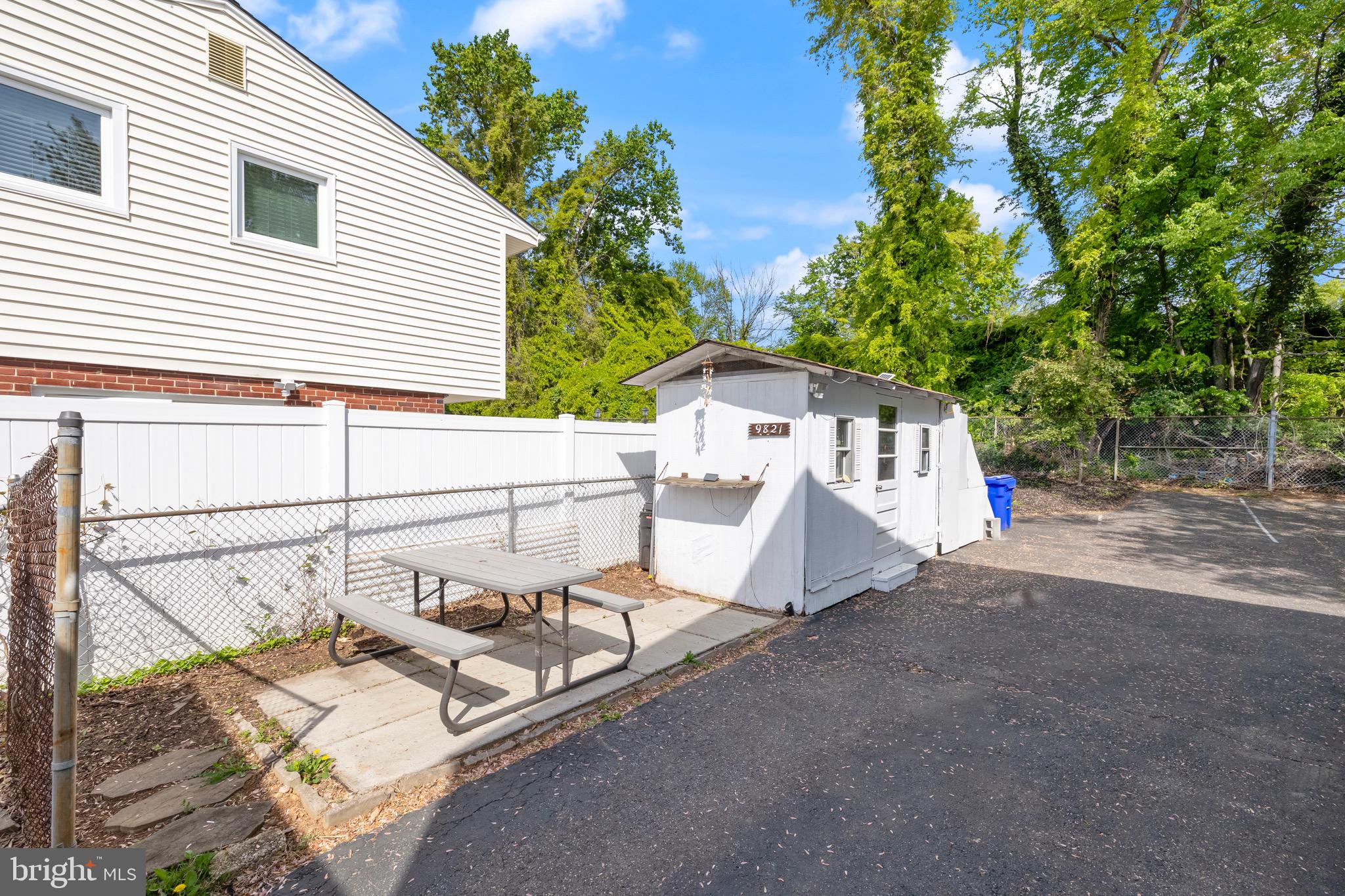 9821 Singleton Drive Bethesda, MD 20817 - Photo 42 of 45 a view of a terrace with sitting area