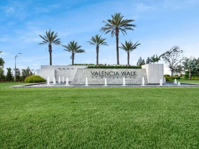 a view of outdoor space with garden and trees