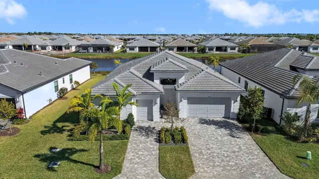 an aerial view of houses with trees